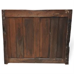 Mouseman - circa. 1920s adzed oak settle or bench, the cresting rail carved with inscription 'Before Honour is Humility', four panel back and plank seat on shaped end supports carved with grotesque masks terminals, carved with mouse signature, by Robert Thompson of Kilburn 
