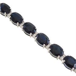 18ct white gold oval cut sapphire and round brilliant cut diamond bracelet, stamped, total sapphire weight approx 29.50 carat, total diamond weight approx 0.45 carat