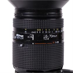 Nikon D80 camera, serial no. 2017183, with Nikon AF Nikkor 1:2.8 35-70mm lens, serial no. 312406, with Sigma carry case