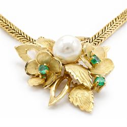 18ct gold pearl and emerald floral necklace, single cultured white / pink pearl, with leaf and emerald set flower surround, to a wheat link chain necklace, stamped