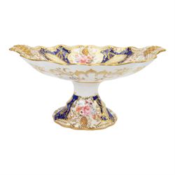 Collection of 19th century porcelain dessert wares, comprising Bloor Derby dish, circa 1825, Spode Felspar shaped oval dish, circa 1820, Ridgeway shaped oval footed dish with twin handles, circa 1840, Ridgeway dish, circa 1820, and tazza and dish, probably Minton, pattern 4810, each decorated in various patterns with floral sprays against dark blue grounds and heightened with gilt