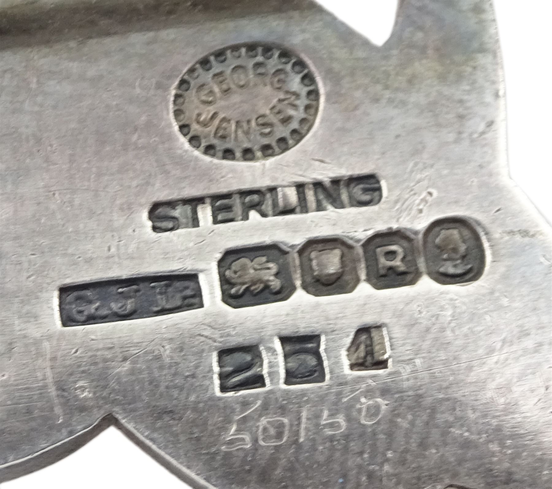 Silver double dolphin brooch designed by Arno Malinowski for Georg Jensen, No. 251, London 1952