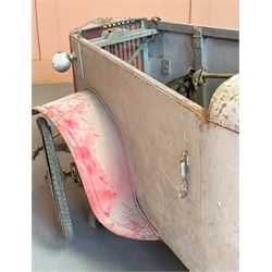 1930's open top two seater electric cycle sports car, in barn find condition, powered by 12v batteries and an electric motor. N.B. There is photographic evidnce to suggest this car was previosuly road registered with 'DMT8' liscence plate. L270cm, W100cm.  - COLLECTION BY APPOINTMENT FROM: The White House, Thirsk Road, Easingwold, York, YO61 3NF - CALL 01723 507111 TO ARRANGE