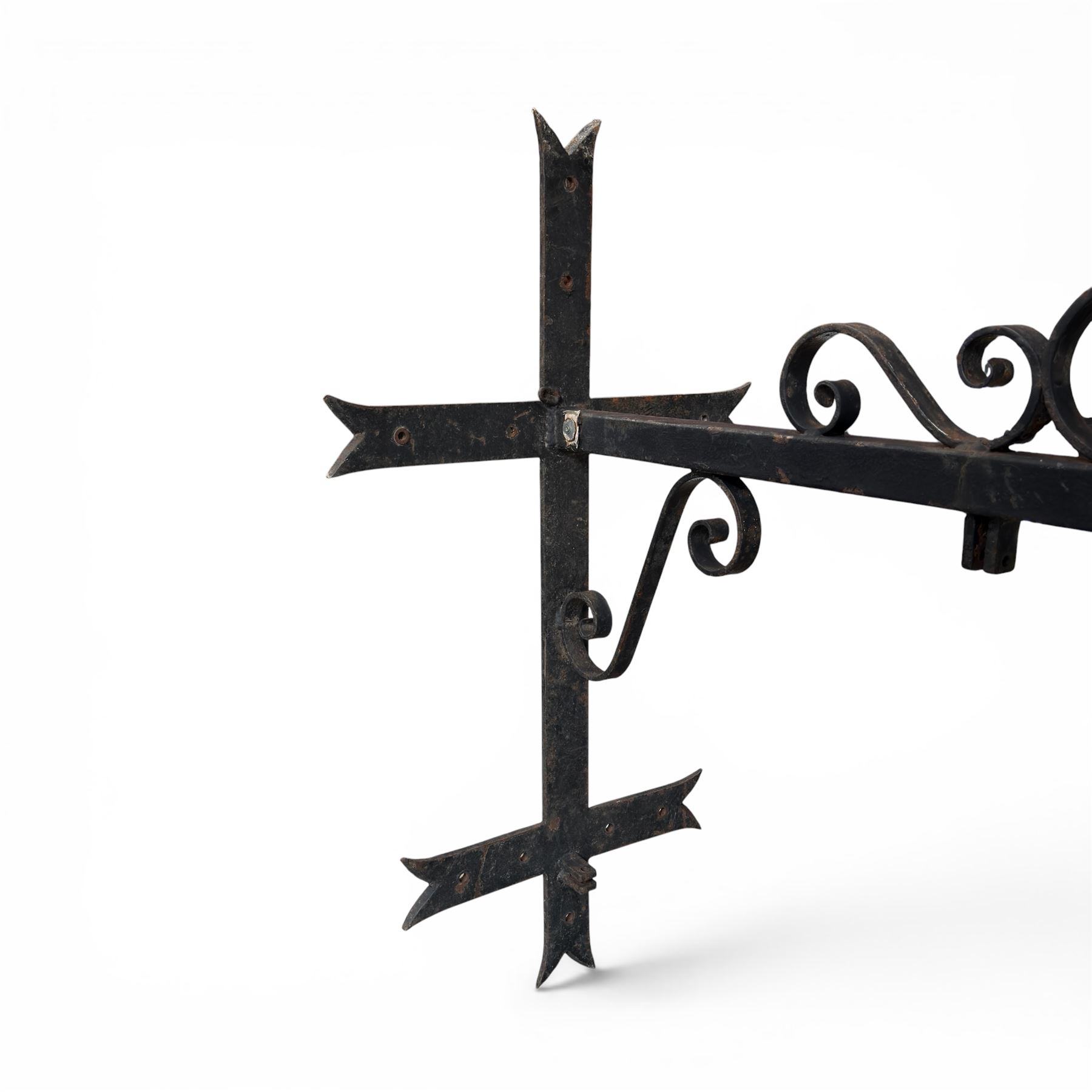 Antique wrought iron sign bracket, with strapwork scroll decoration and arrow form support, in weathered black painted finish