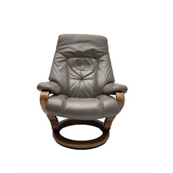Himolla - reclining swivel armchair, upholstered in grey leather; and matching footstool