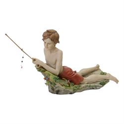 Three Capodimonte figures, including Male artist, Tramp on a Bench, and Boy Fishing, largest H35cm
