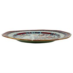Chinese Qianlong plate of hexagonal form, decorated with riverside scene in a floral boarder D23cm