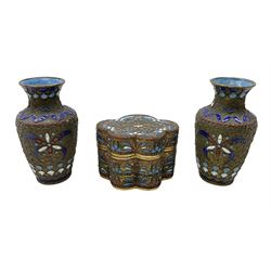 Two miniature cloisonné vases with blue, white and red enamelled decoration, H9cm, together with a lidded box 