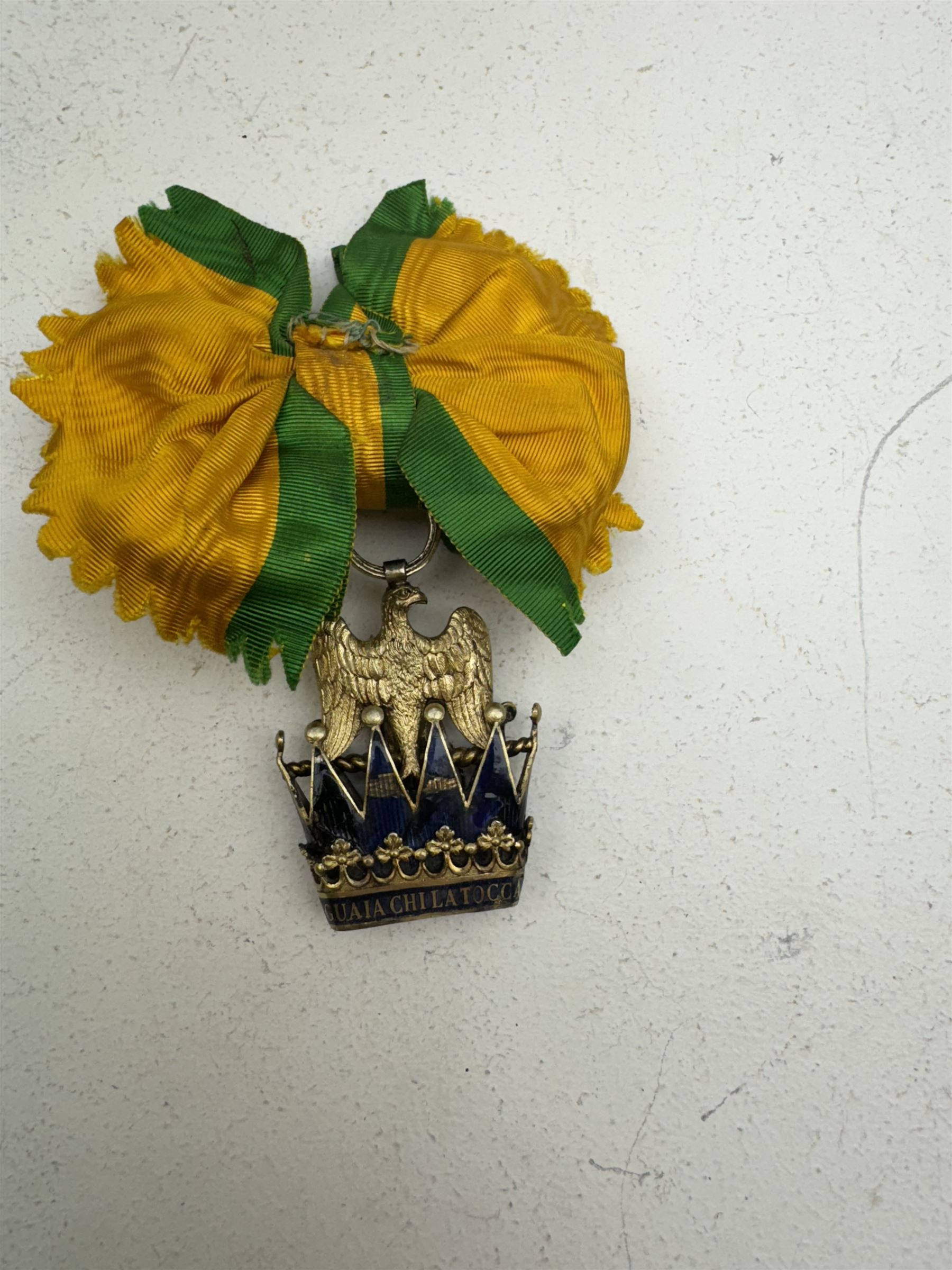 Kingdom of Italy Order of the Iron Crown, replica, the Knight’s breast badge in gilt metal and enamel with crowned bust of Emperor Napoleon facing left to the centre, in fitted case; Auctioneer's Note: The order was created by Napoleon I on June 5, 1805, as the highest order of the Italian kingdom, abolished in 1814.After the transition of most of the Italian kingdom under the rule of the Austrian Empire, the order was restored by the emperor Austrian in 1816.