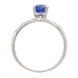White gold sapphire and diamond ring, single oval cut sapphire of approx 1.00 carat, with split design diamond set shoulders, hallmarked 14ct