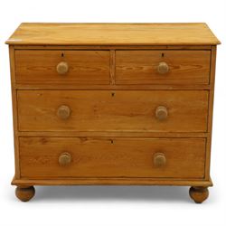 Victorian stripped pine chest, rectangular top over two short and two long drawers with turned wooden knob handles, on bun feet