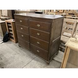 Early 20th century oak cupboard disguised as a chest of eight drawers, reeded edge over two doors with panelled facias - THIS LOT IS TO BE COLLECTED BY APPOINTMENT FROM THE OLD BUFFER DEPOT, MELBOURNE PLACE, SOWERBY, THIRSK, YO7 1QY