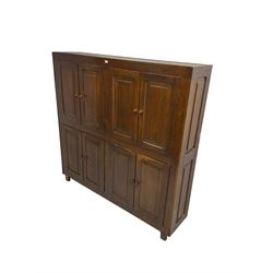 Large oak cupboard, fitted with eight panelled doors