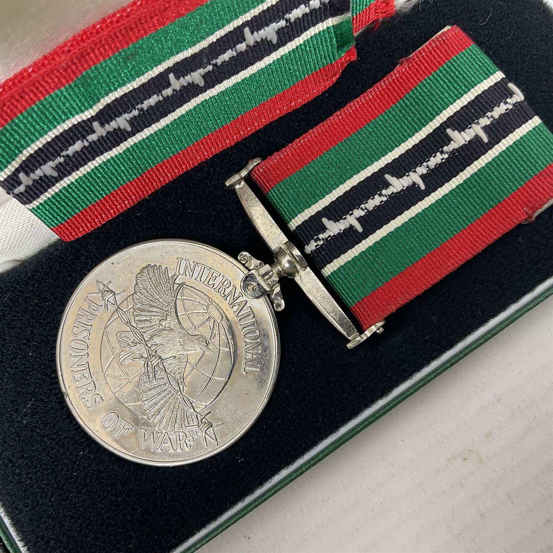 Two Imperial Service Medals to Elsie Hannah Ferguson and Fred Whitehead; each in original case; WWI Special Constabulary Medal to Inspr. Alfred W. Thompson; modern Prisoner of War Medal; cased; replica Victoria Cross and India Mutiny Medals with archive of information relating to Pte. Robert Newell V.C. 9th Lancers; replica Victoria Cross and George Cross with miniatures; and other replica medals etc