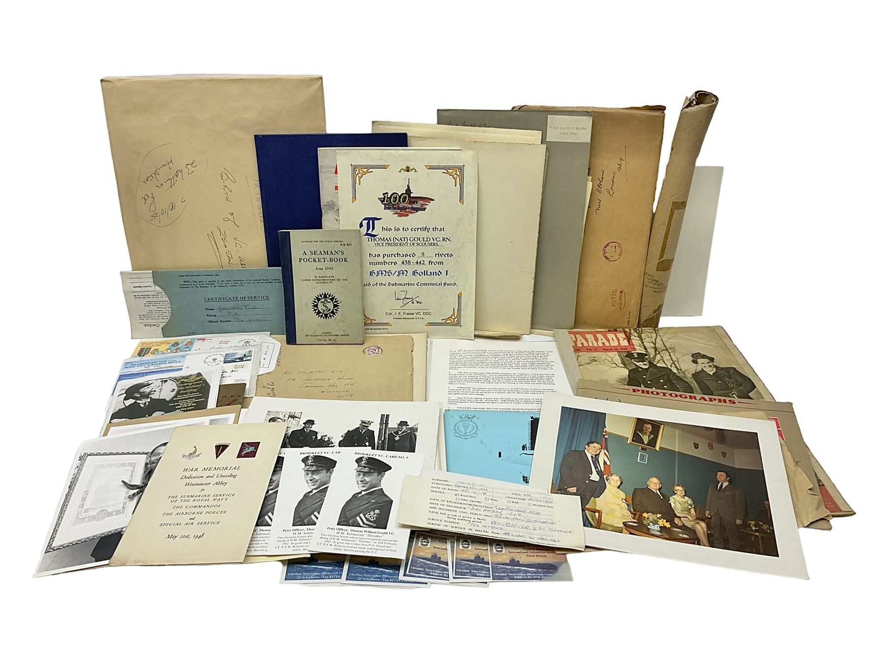 WW2 submarine interest - archive of ephemera and photographs relating to submariner Petty Officer (later Lieutenant) Thomas William Gould V.C. of HMSub Thrasher; predominantly post-war with later copies of contemporary photographs and documents including Certificate of Service in slip-case, War Patrol Reports, First Day Covers, press cuttings, 'For Valour' film script, business cards etc.
Auctioneer's Note: An extract from Gould's VC award citation reads 
