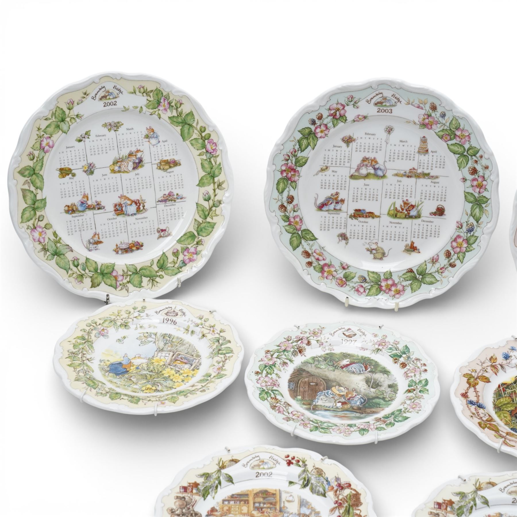 Set of four Royal Doulton Brambly Hedge Calendar plates, 2002-2005, together with ten year plates, 1996-2005 (14)