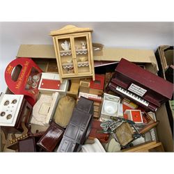 Large quantity of 1970s doll's house furniture, predominantly stained or painted wooden, including lounge, dining room, kitchen and bedroom pieces, bathroom fittings, bureaux and desks, piano, lamps, fire-surrounds etc; various scales
