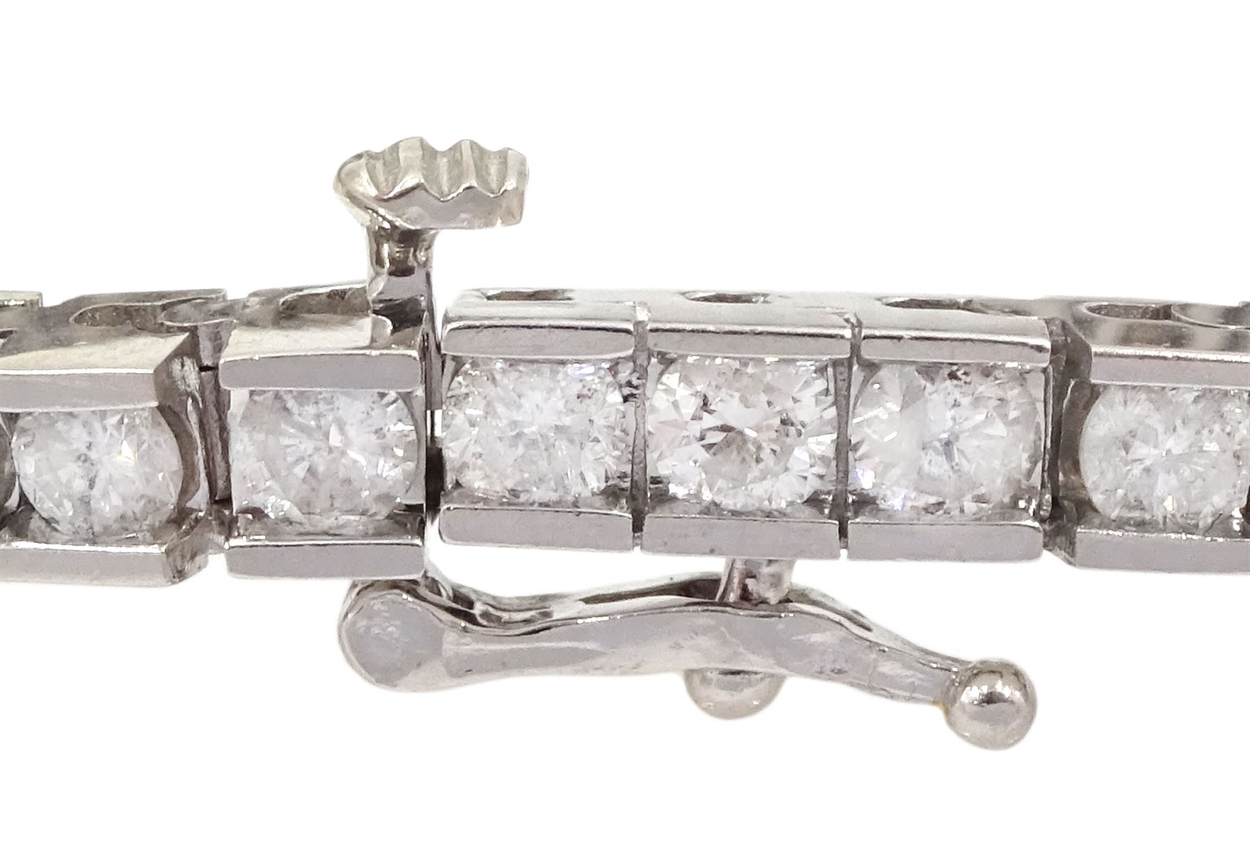 White gold round brilliant cut diamond line bracelet, stamped 14K, total diamond weight approx 4.85 carat