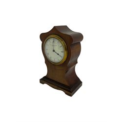 Edwardian -  bedside table clock in a mahogany veneered case in the Art Nouveau style,  with a fixed bezel and enamel dial, Roman numerals, minute track and steel spade hands, 8-day timepiece going barrel movement with a lever platform escapement, wound and set from the rear. With key.