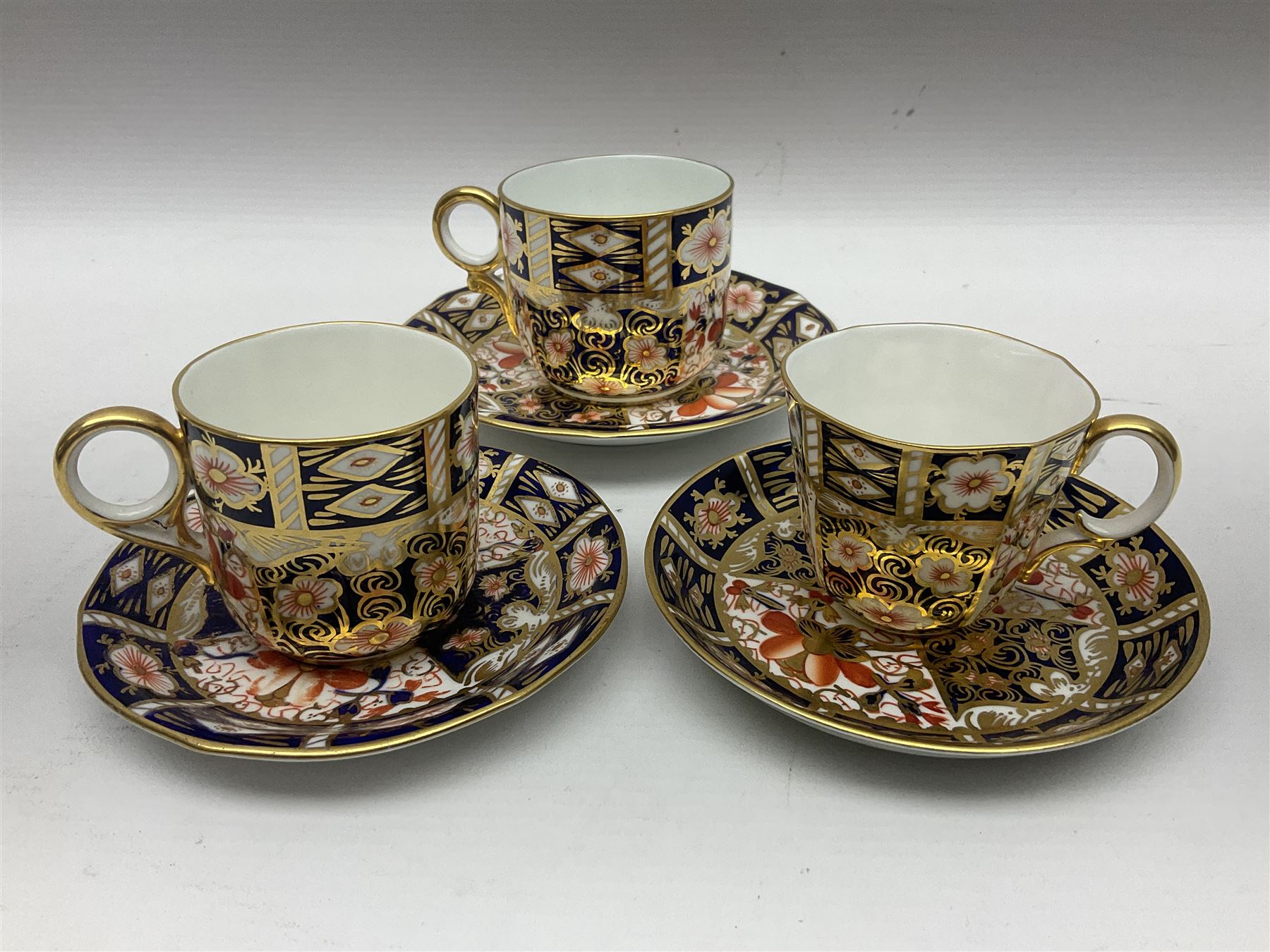Six Royal Crown Derby cups and saucers all in imari pattern 2451, in various shapes  