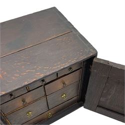 18th century oak spice cupboard, single panelled door enclosing eight drawers of various sizes, reed moulded front edges