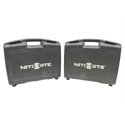 Two Nite-Site add-on kits in hard plastic carrying cases; one with charger