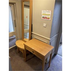 Light oak side table, wall mirror and oval coffee table- LOT SUBJECT TO VAT ON THE HAMMER PRICE - To be collected by appointment from The Ambassador Hotel, 36-38 Esplanade, Scarborough YO11 2AY. ALL GOODS MUST BE REMOVED BY WEDNESDAY 15TH JUNE.