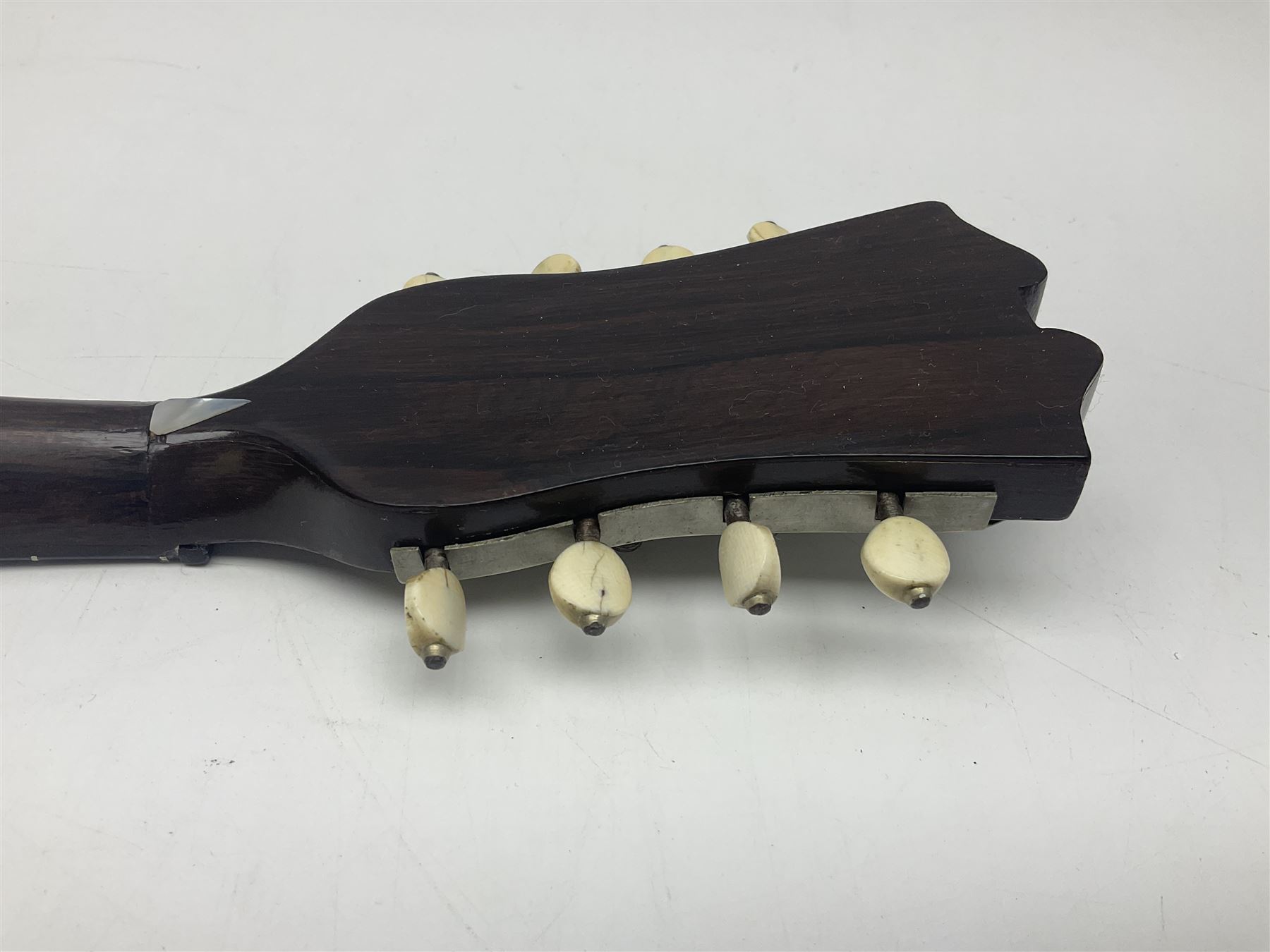 French mandolin with segmented lute back and mother-of-pearl inlaid spruce top; bears label for 'Jerome Thibouville-Lamy & Cie Paris L60cm; and another unmarked flat-back mandolin; both for completion (2)