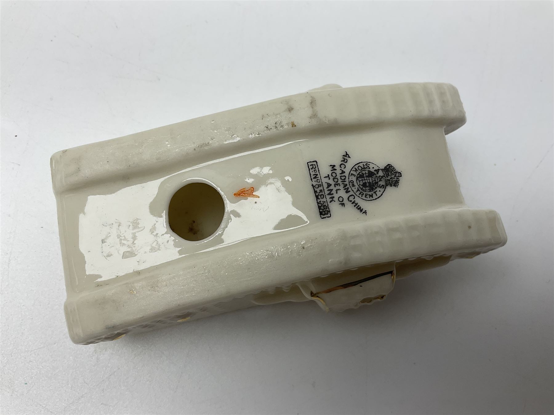 Ten WW1 crested china military models of tanks and field guns; various makers including Goss, Grafton China, Arcadian China, Savoy China etc; various crests including Portsmouth, Brighton, Pendleton, Paignton, Cowes, Flamborough etc (10)