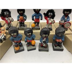 Collection of twenty two Robertson golly figures, H8cm