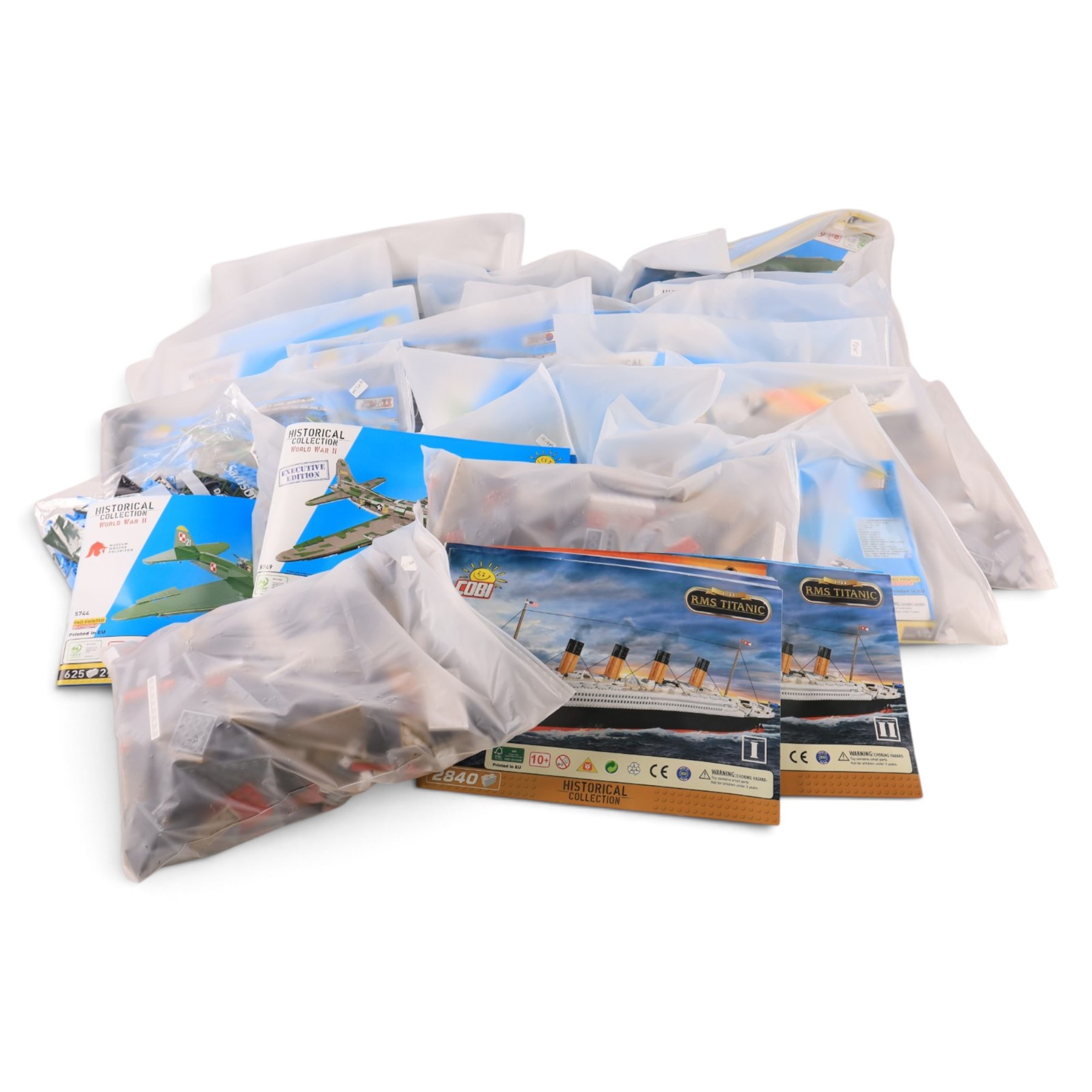 Eighteen Cobi Bricks model kits, including 1912 RMS Titanic and  Historical Collection aircraft set, unboxed with instructions 