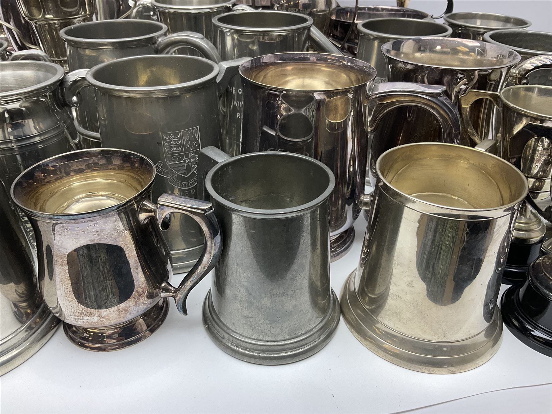 Collection of pewter and silver-plated trophy cups and presentation tankards, largest H28cm
