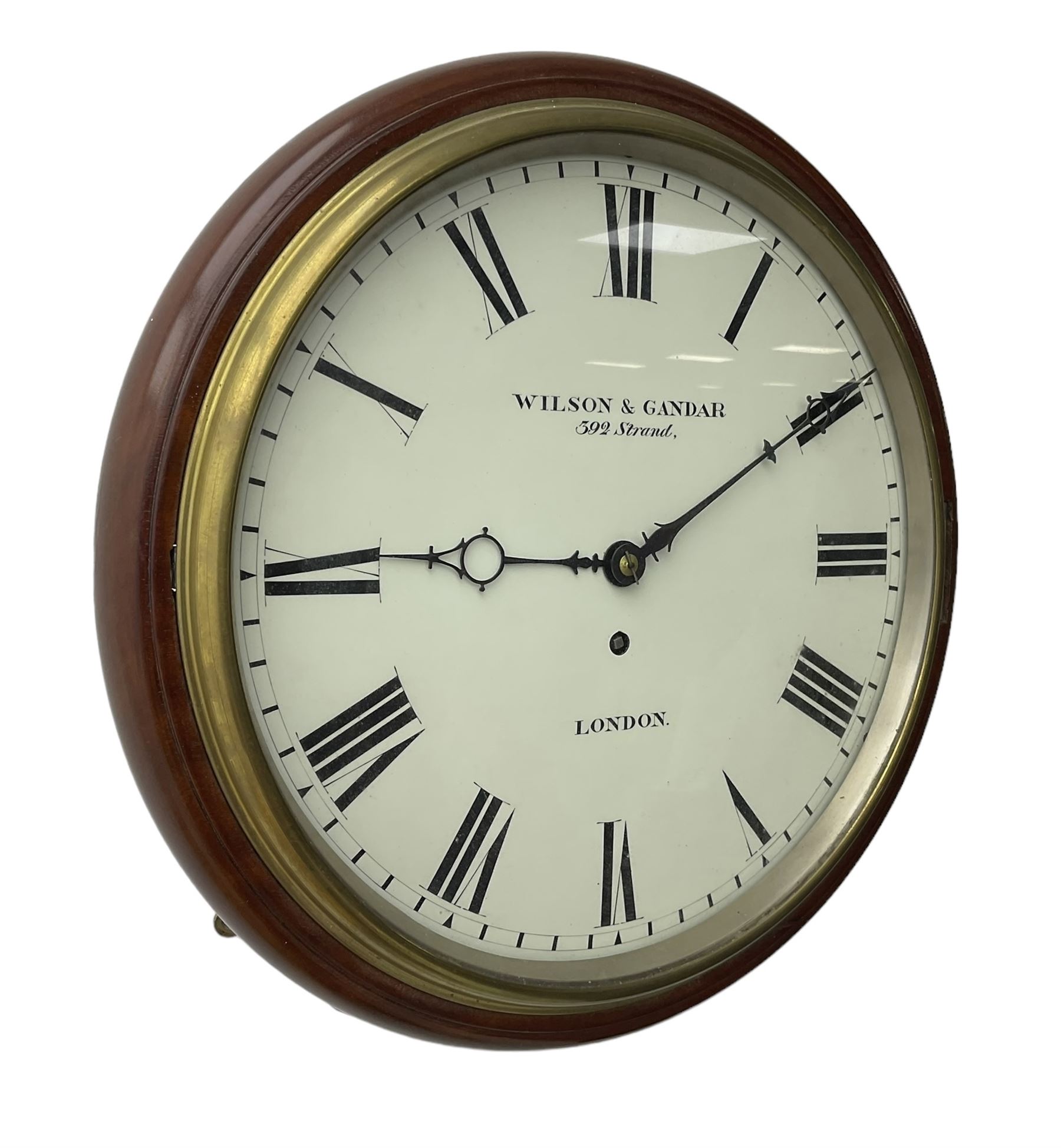 Wilson & Gandar of London -  Fine 19th century fusee timepiece wall clock, mahogany case with a cast brass bezel and 12” painted dial, Roman numerals, minute track and fine pierced moon hands, wire fusee driven movement with curved shoulder movement plates and a recoil anchor escapement. With key and pendulum. Wilson & Gandar are recorded as working in The Strand, London, 1851-75.
