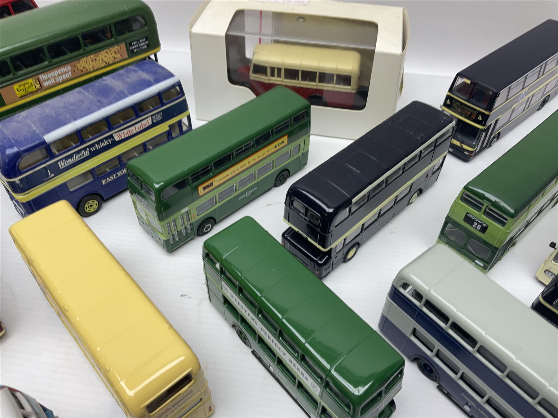 Thirty-one modern die-cast models of buses, coaches and trams by Corgi, EFE, Solido etc; predominantly unboxed but one in box