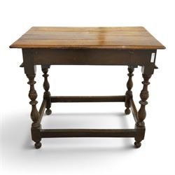18th century oak lowboy, rectangular top with moulded edge, fitted with single frieze drawer carved with scrolling fruiting vines and stylised plant motifs, raised on bobbin-turned supports united by box stretcher 