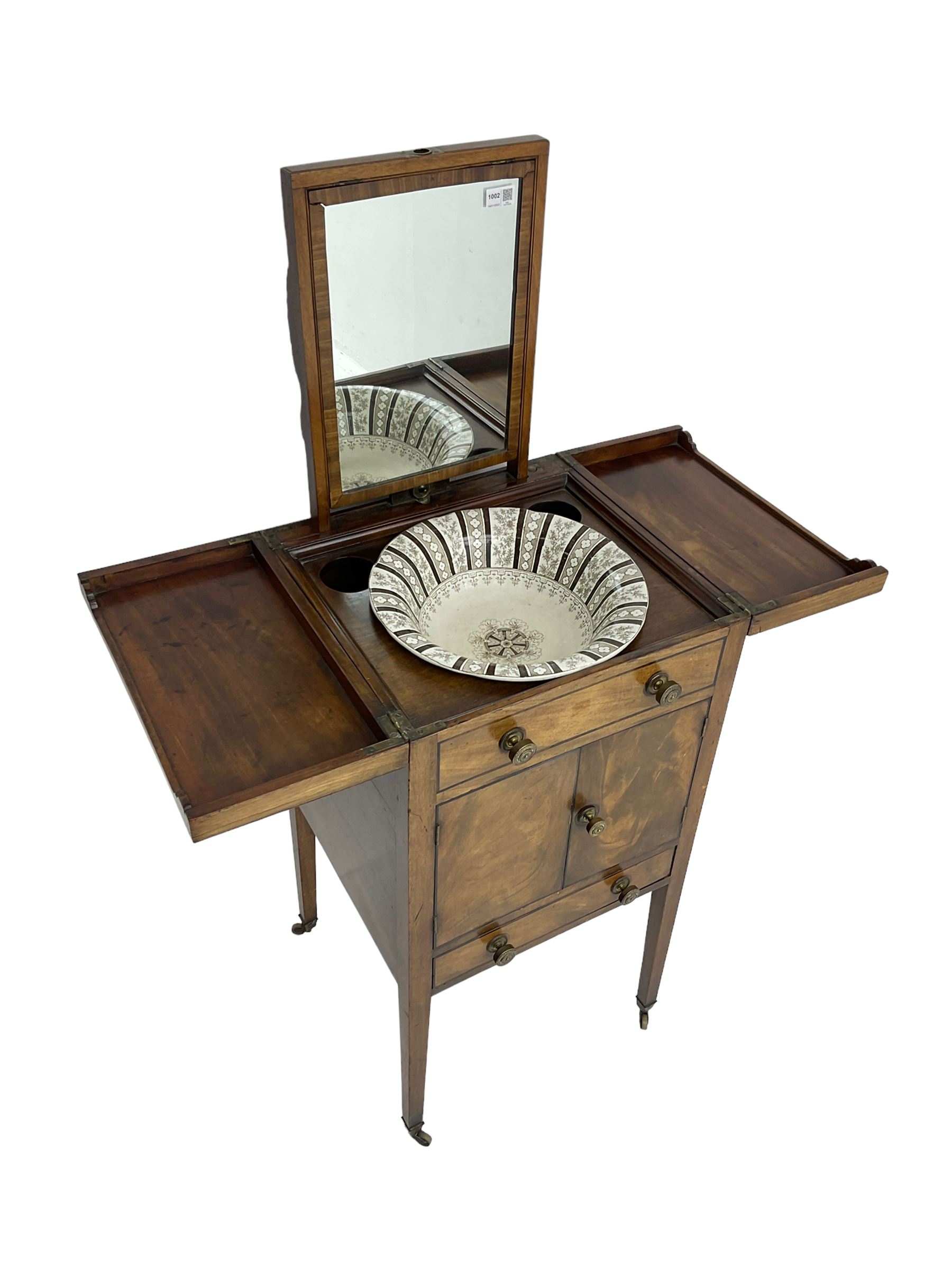 Georgian mahogany washstand cabinet, the double hinged lid opens to reveal wash basin and lift up tilting mirror, false drawer over double cupboard and drawer, on square supports with brass cups and castors