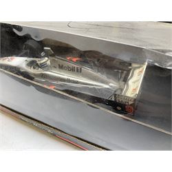 Two Collezione Classico large scale die-cast models of a Ferrari 1972 312P with Racing Fuel Pump and Ferrari 1958 250 Testa Rossa with Road Fuel Pump; and two Minichamps 1:18 scale models of a McLaren Mercedes Racing Car and Auto Union Typ C racing car; all boxed (4)