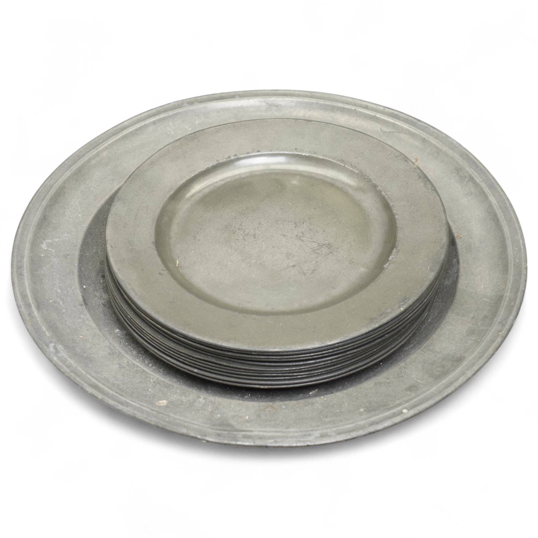 Large collection of 18th century and later pewter plates, of graduating sizes, and a group of tankards, various touch marks and impressions