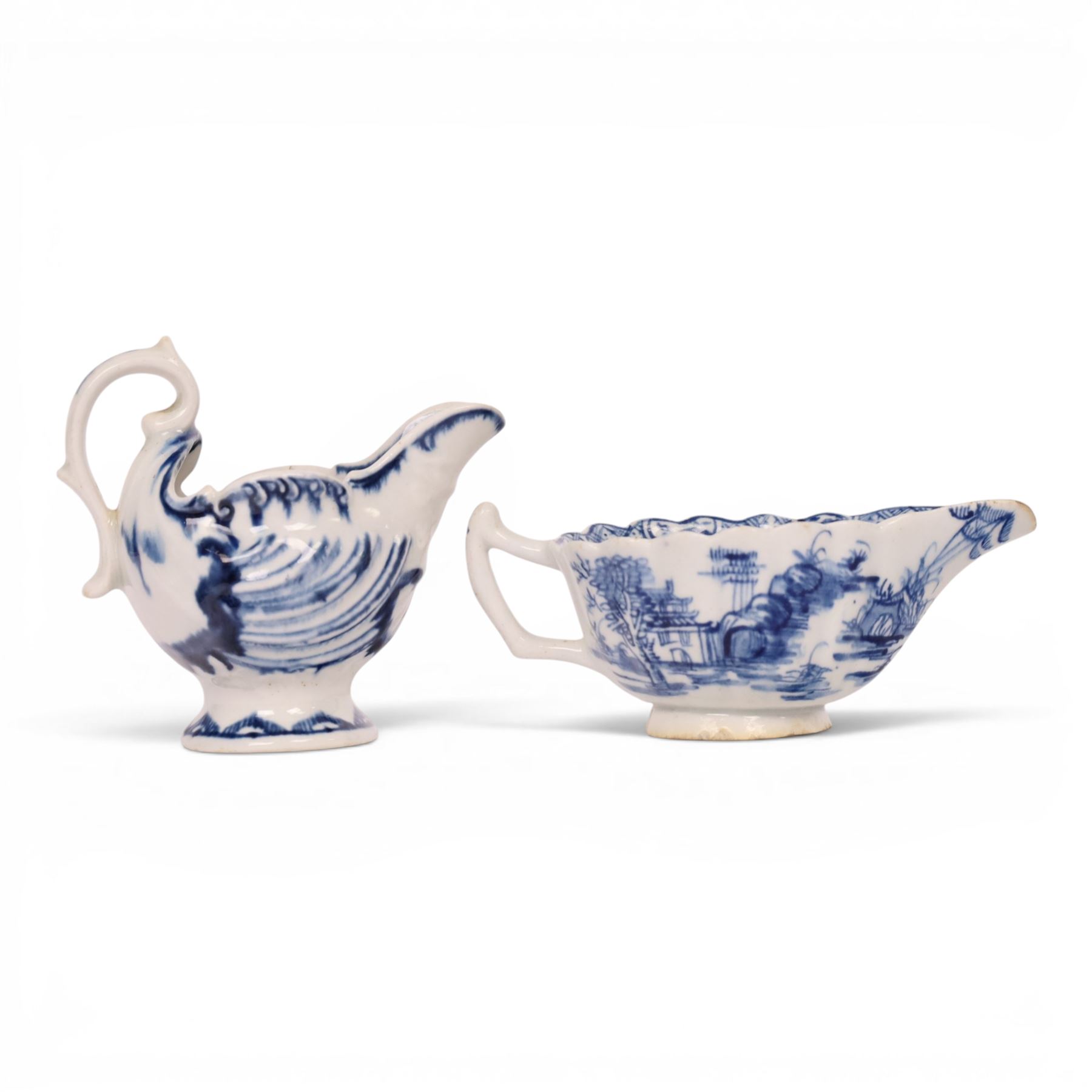 Derby blue and white dolphin ewer cream boat, circa 17750, H8cm, together with a Bow blue and white cream boat, decorated in the Desirable Residence pattern, circa 1760, L11.5cm