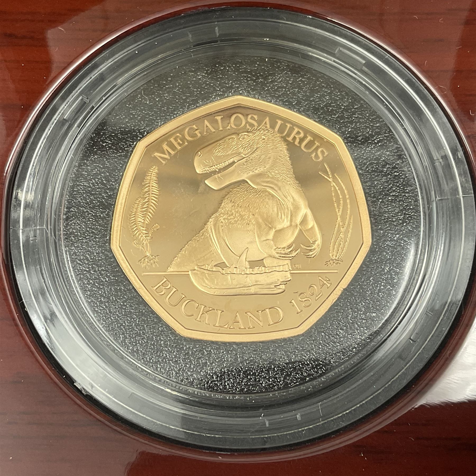 The Royal Mint United Kingdom 2020 'Tales of the Earth Megalosaurus' gold proof fifty pence coin, cased with certificate