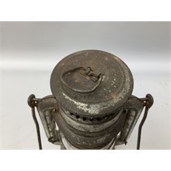 Copper and brass ship’s lamp marked ‘Anchor’, H25cm, Feuer hand storm lantern, Bialaddin Model 315 paraffin lamp and an Anchor lamp (4)