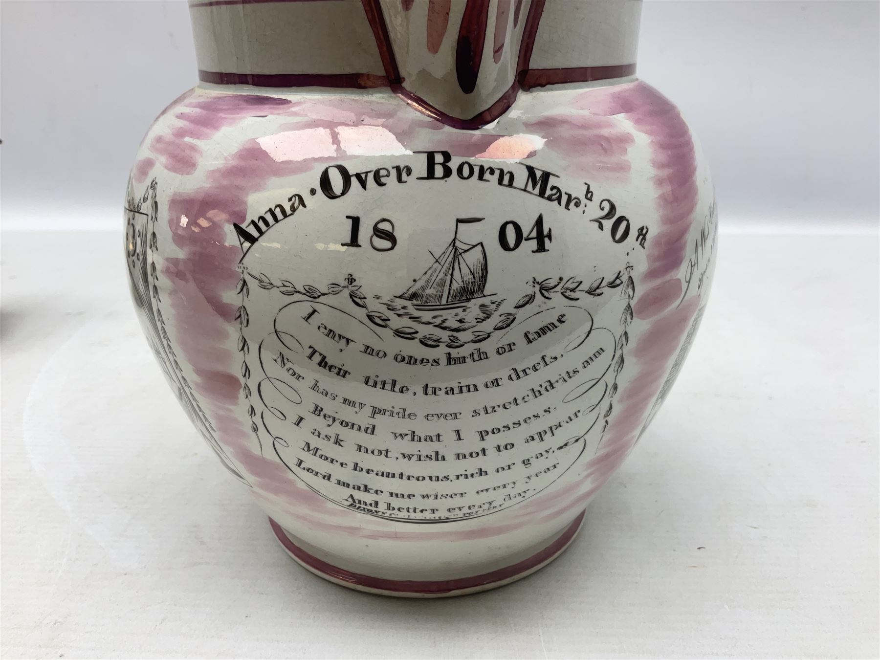 Early 20th century Sunderland lustre jug, decorated with transfer Masonic scene and poem 'The World is in Pain/Our Secrets to Gain/But Still Let Them Wonder and Gaze/The Never Can Divine/The World Nor The Sign/Of a Free and Accepted Mason', the reverse decorated with Sunderland River Wear cast iron bridge scene below text (a/f), together with a copper lustre jug, and pink lustre bowl, jug H20cm