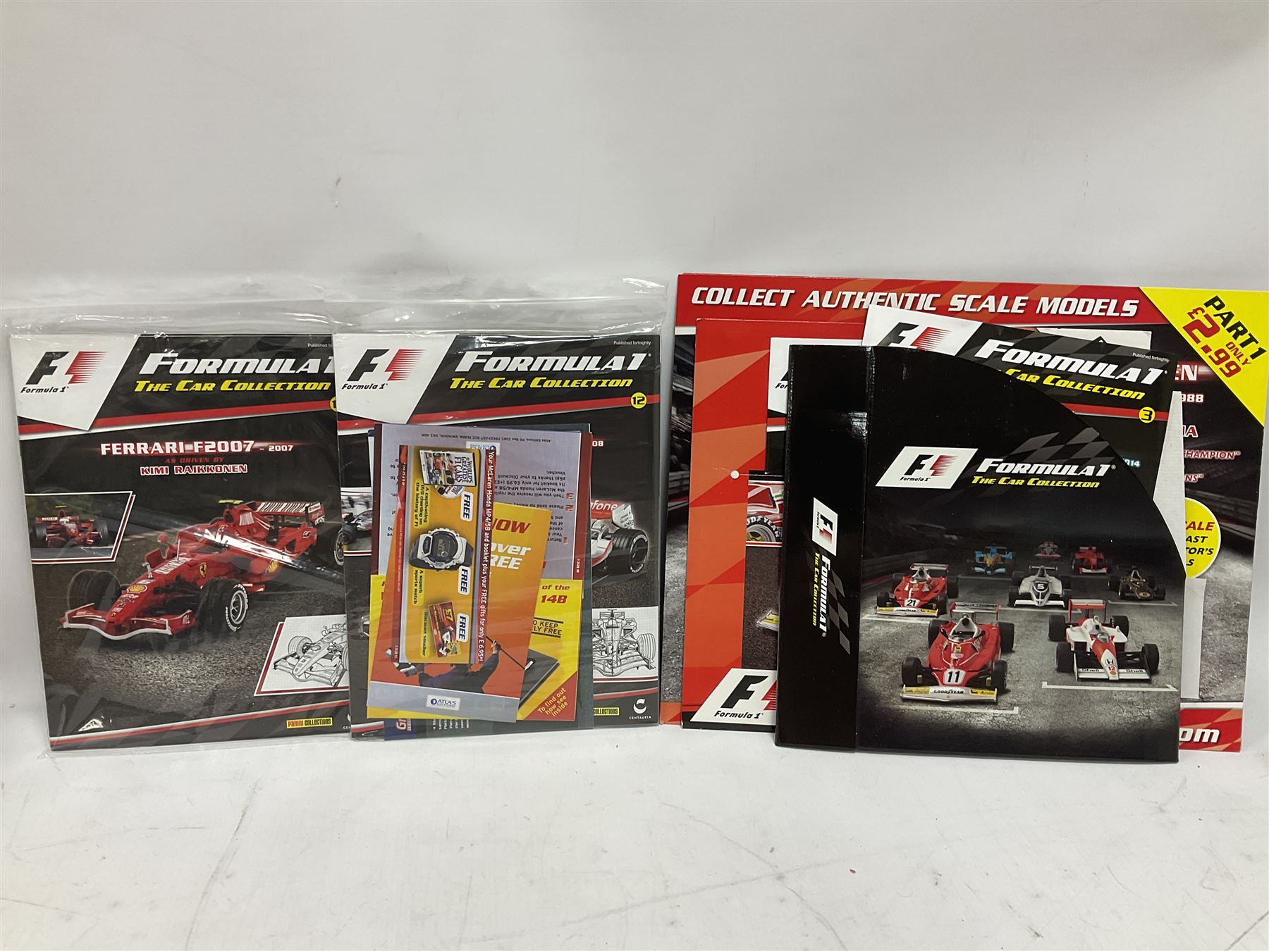 Panini Formula 1 The Car Collection - twelve blister packed racing cars and quantity of periodicals; nine mostly unopened Atlas Editions British Touring Car Champions; and six other boxed/blister packed die-cast models of racing cars
