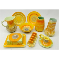  Nine pieces of Shelley Art Deco Harmony drip glaze ceramics comprising two vases, H16cm, chamber stick, toast rack, butter dish and cover, bowl, two tea plates and jug (9)  
