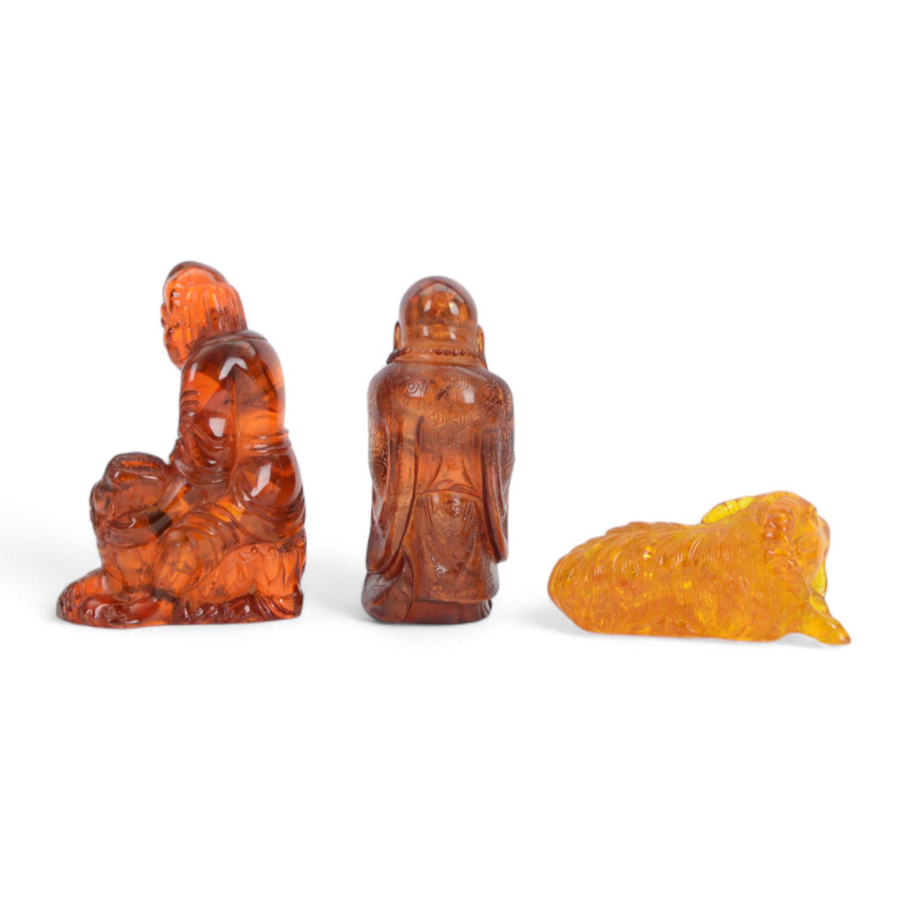 Two clear quartz figures of Buddha, together with five resin figures, including pair of zodiac balls, ram and Buddha, tallest H13cm