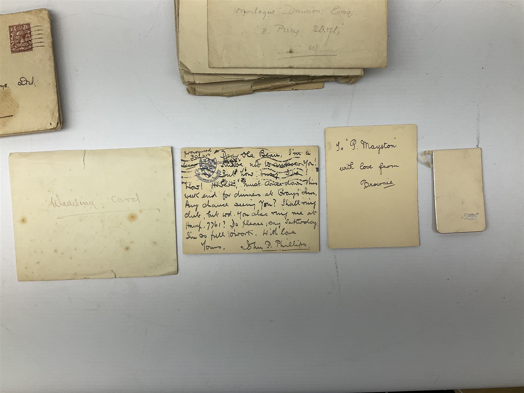 Montague Dawson interest - a correspondence of forty manuscript letters and notes to the marine artist from the same lady who signs herself 'Browne' or 'Brownie', c1920-24. The letters are in two sections, firstly a series of twenty-three hand written notes, all in the original envelopes and privately delivered to Dawson at Percy Street in London c1920, one envelope featuring a small unsigned pencil sketch of a sailing vessel. The second section of seventeen letters all date between April and July 1924 whilst Dawson was serving as the official artist on the South Seas Expedition on the S.Y. St. George where he was providing illustrated reports to The Graphic magazine. These letters (all but one in their original stamped envelopes) are far more detailed, up to twelve pages in length, and include two original photographs of the lady sent to Dawson during this Expedition.