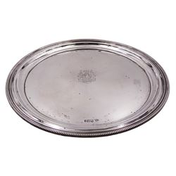 Edwardian silver tray, of circular form with beaded rim and engraved crest to centre, hallmarked John Round & Son Ltd, Sheffield 1903, D25cm, approximate weight 16.63 ozt (517.3 grams)