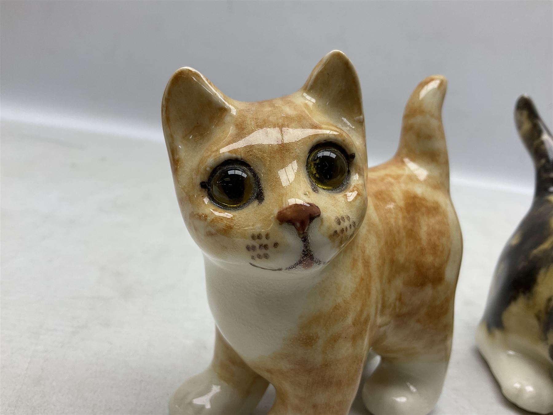 Two Winstanley figures of kittens, comprising tabby cat no 2 and ginger cat no 1, both with inset eyes and painted marks beneath, tallest H11cm