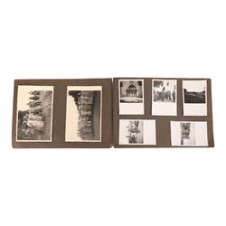 WWII German Soldiers photo album, 1942, including photographs of soldiers in uniform posing during parade etc  