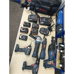 A quantity of Bosch Professional power tools including the GSB 18-2LI plus drill, GOP18V V-EC multi tool, GWS 18V-LI angle grinder, GDR 18-Li drill and a GSA 18 V-LI reciprocating saw with carry bag